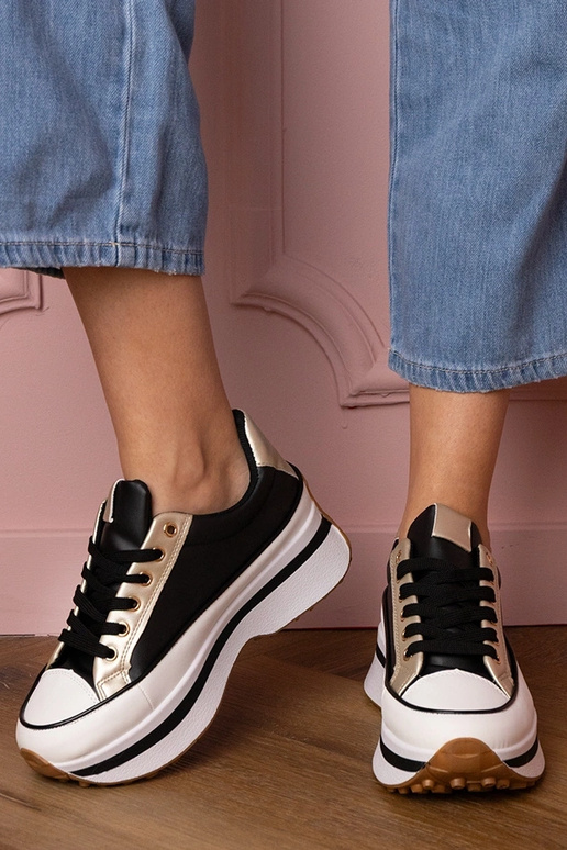 Melnas sieviešu sporta kurpes uz...