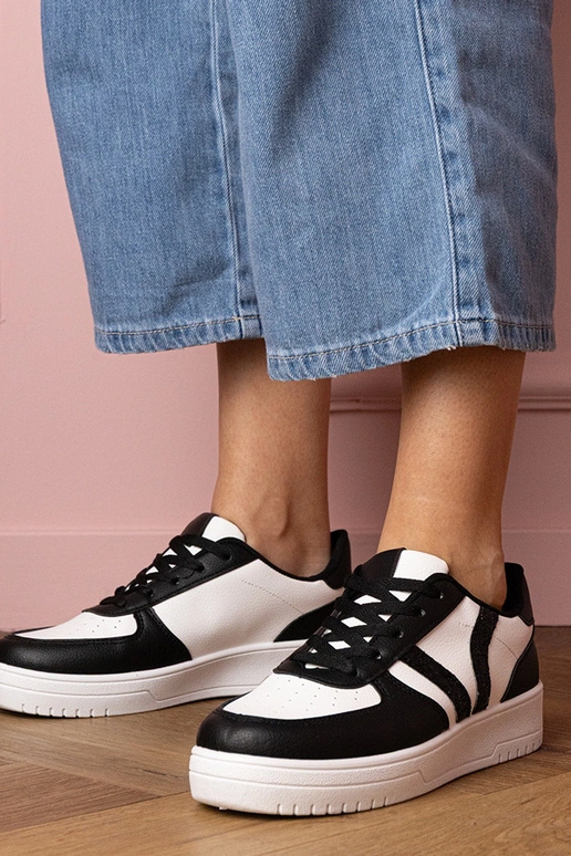 Melnas sieviešu sporta kurpes ar...