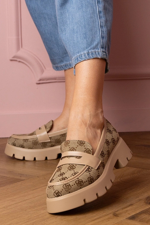 Brūni mokasīni sievietēm ar izšuvuma...