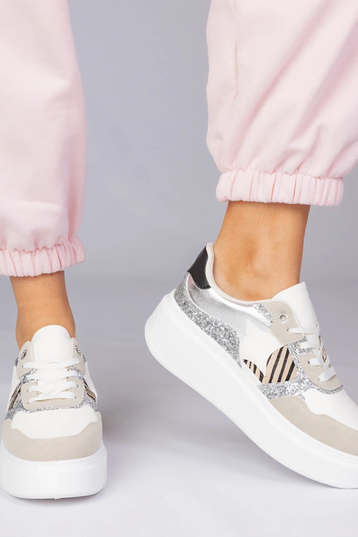 Smilšu krāsas sporta apavi ar...