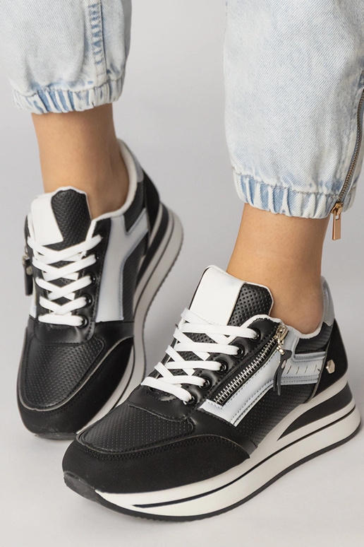 Melnas sporta apavi ar rāvējslēdzēju,...