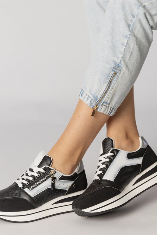 Melnas sporta apavi ar rāvējslēdzēju,...