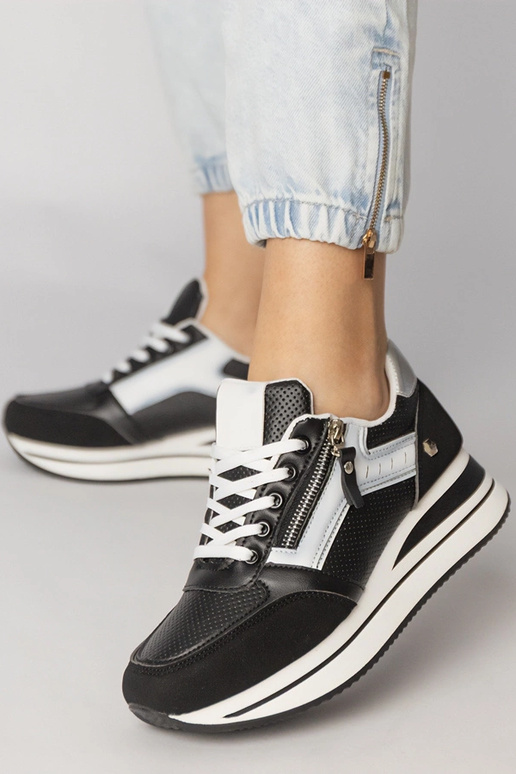 Melnas sporta apavi ar rāvējslēdzēju,...