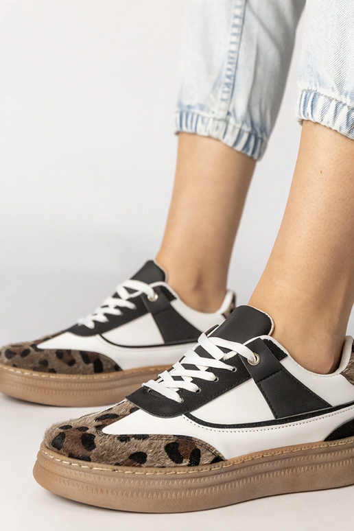 Melni-baltie sporta apavi ar panteru...