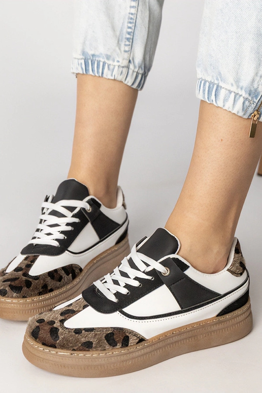 Melni-baltie sporta apavi ar panteru...