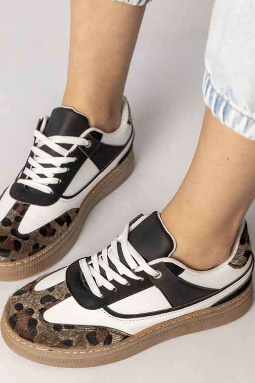 Melni-baltie sporta apavi ar panteru...