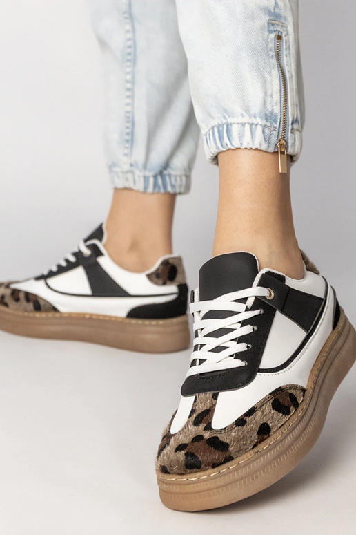 Melni-baltie sporta apavi ar panteru...