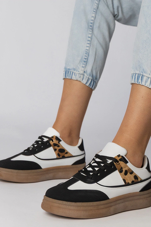 Baltie-melnie sporta apavi ar panteru...