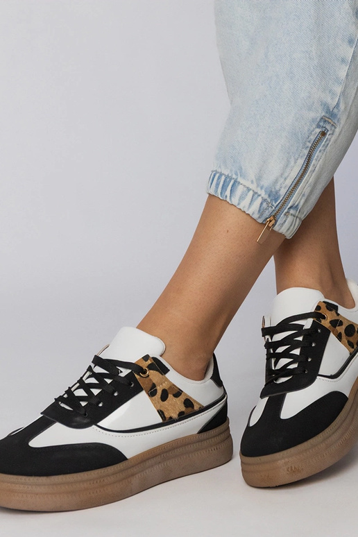 Baltie-melnie sporta apavi ar panteru...