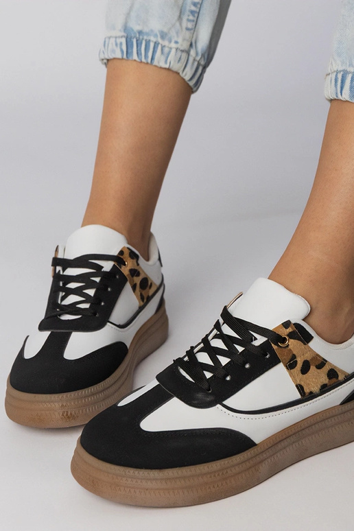 Baltie-melnie sporta apavi ar panteru...