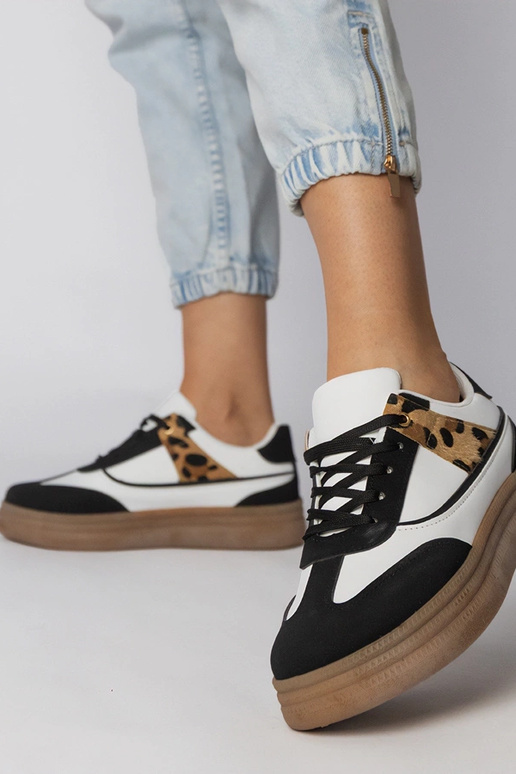 Baltie-melnie sporta apavi ar panteru...