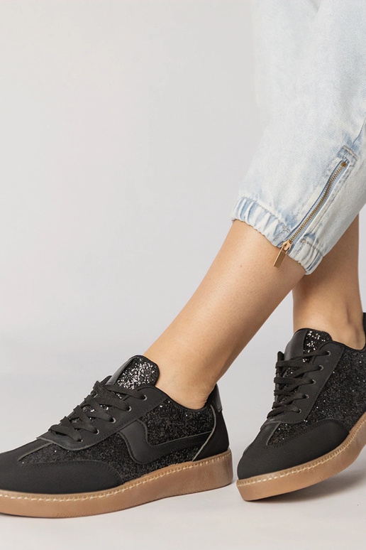 Melni sieviešu sporta apavi ar...