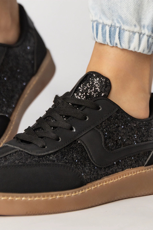 Melni sieviešu sporta apavi ar...