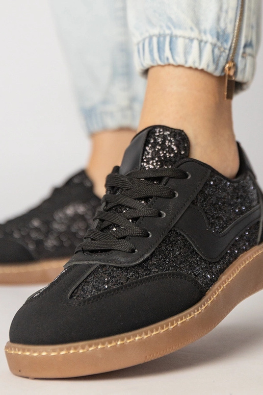 Melni sieviešu sporta apavi ar...