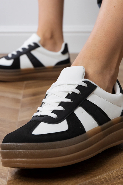 Melni sieviešu sporta apavi uz...