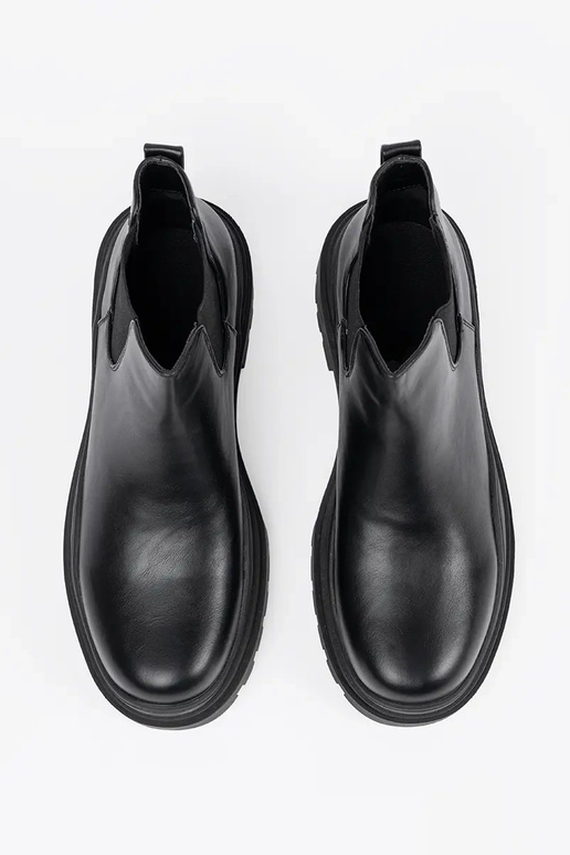 Melnās sieviešu botki uz platformas