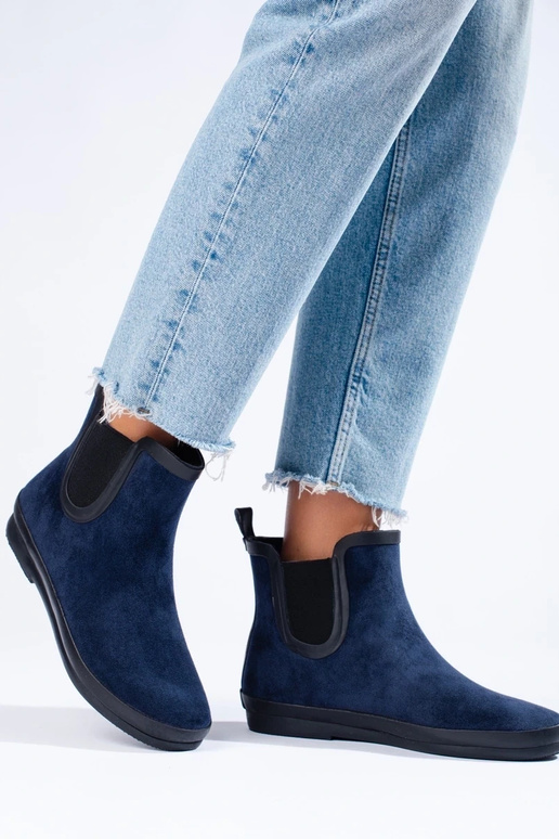 zamšādas gumijas apavi izolēts Zilas... zamšādas gumijas apavi izolēts Zilas...