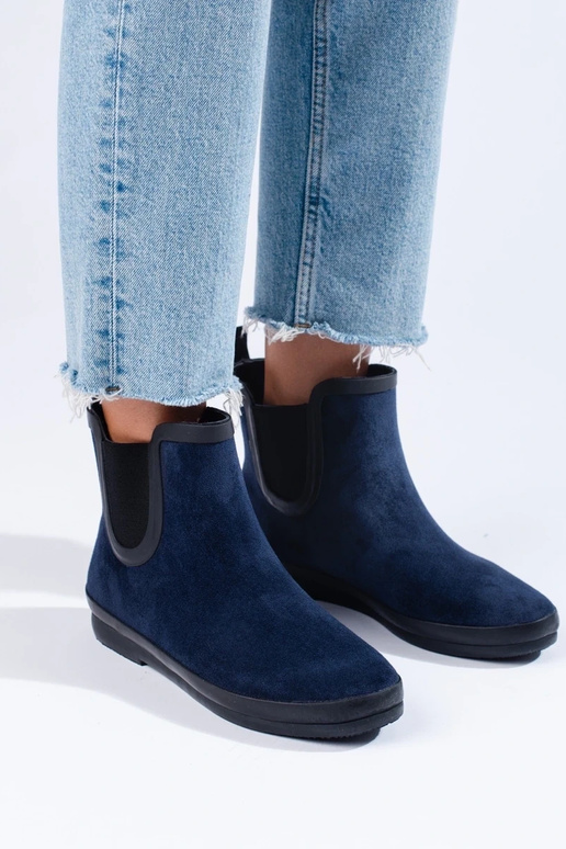 zamšādas gumijas apavi izolēts Zilas... zamšādas gumijas apavi izolēts Zilas...