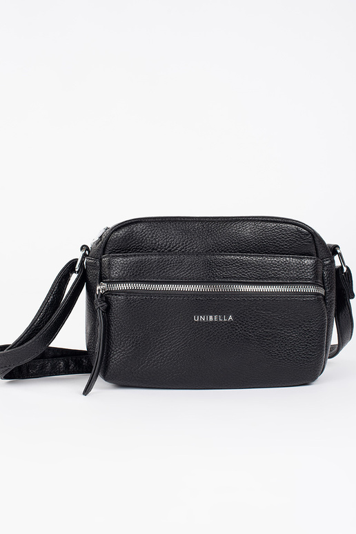 Tā irz melns eleganta rokassomiņa uz...