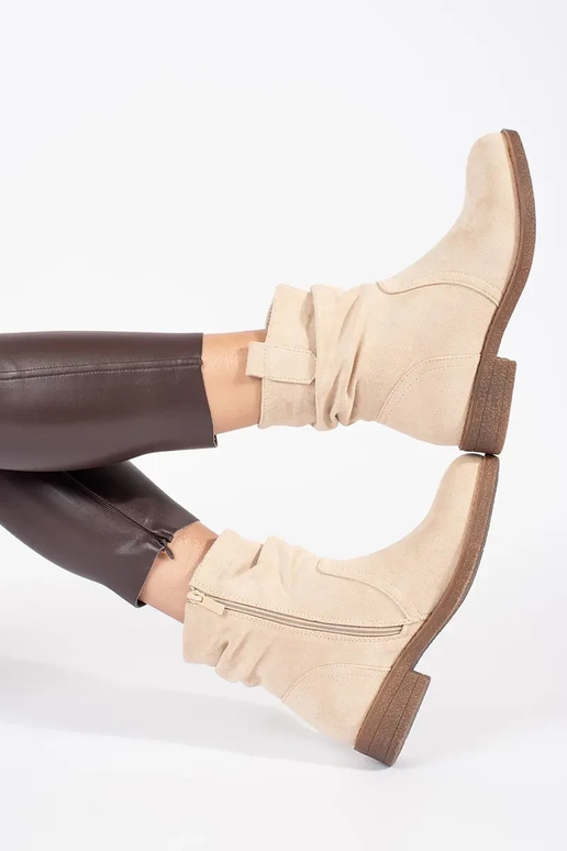 Bēšas krāsas kovboju zābaki