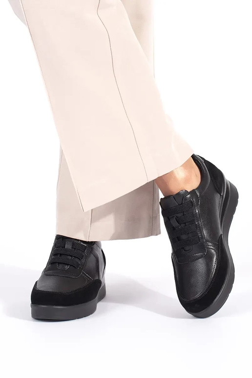 melnas ādas sieviešu ķīļveida kurpes...