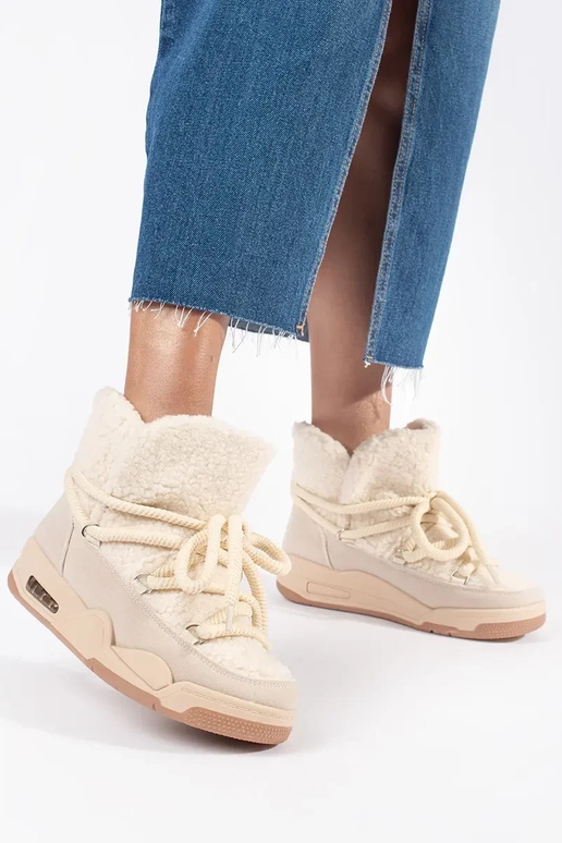 Bēšas krāsas sieviešu sniega zābaki...