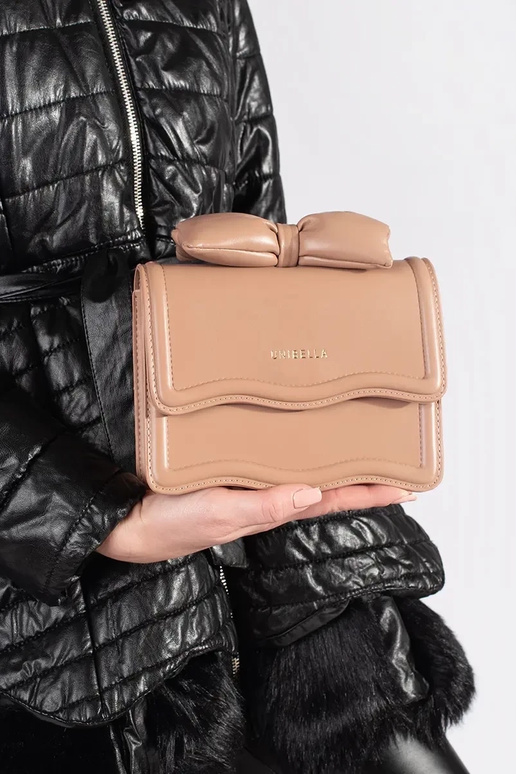 Tā irz bēšs eleganta rokassomiņa ar loku