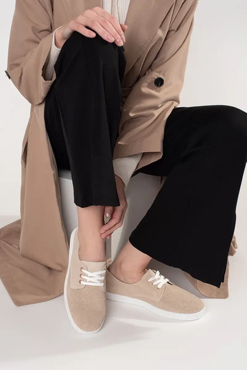 Smilšu krāsas sporta apavi... 2