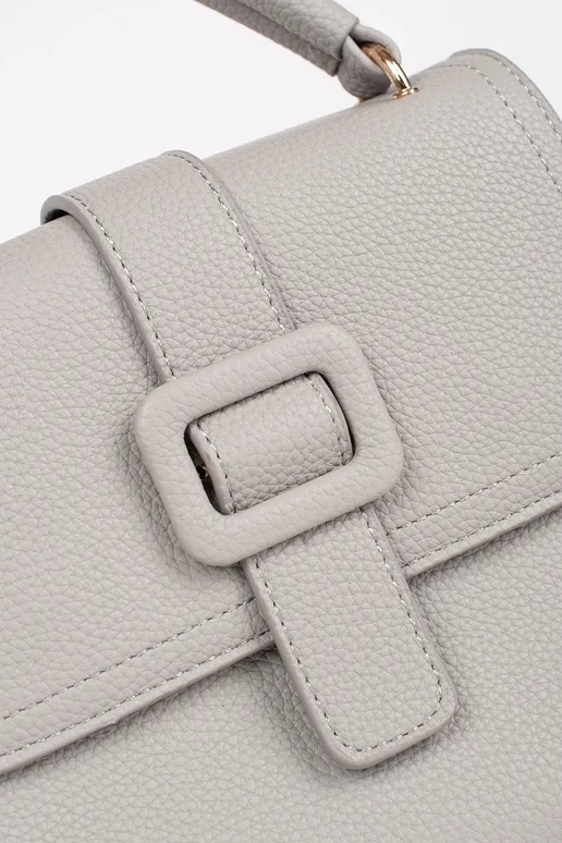 Pelēka maza soma ar zelta elementiem