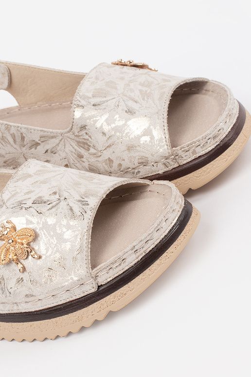 Ziloņkaula krāsas sandales ar... Ziloņkaula krāsas sandales ar...