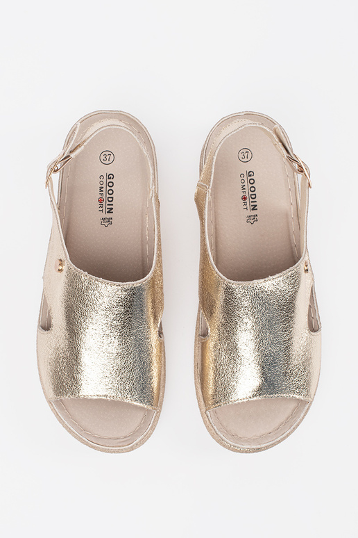 zelta krāsas plakanas sandales ar...