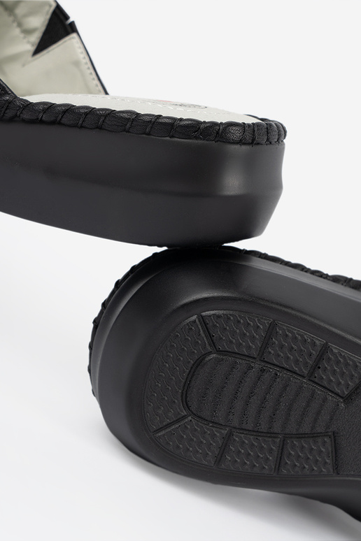 Sieviešu mēteļi ar ādas ieliktņiem...