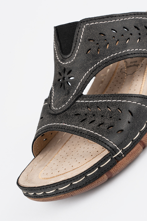 Mēteļi uz platformas melnā krāsā