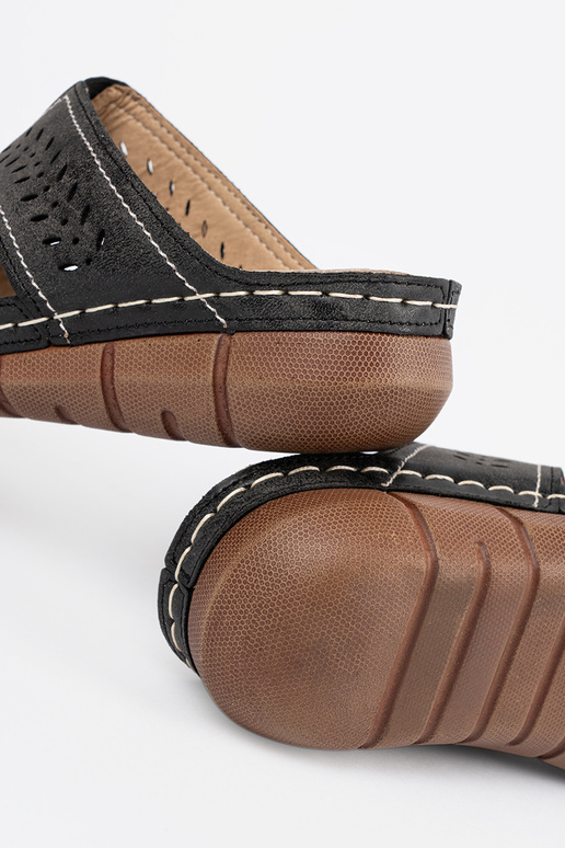 Mēteļi uz platformas melnā krāsā