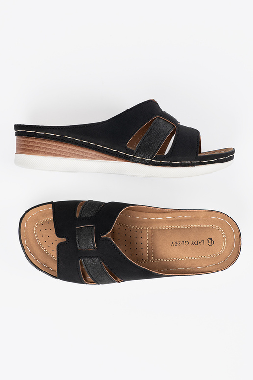 Sieviešu mēteļi melnā krāsā