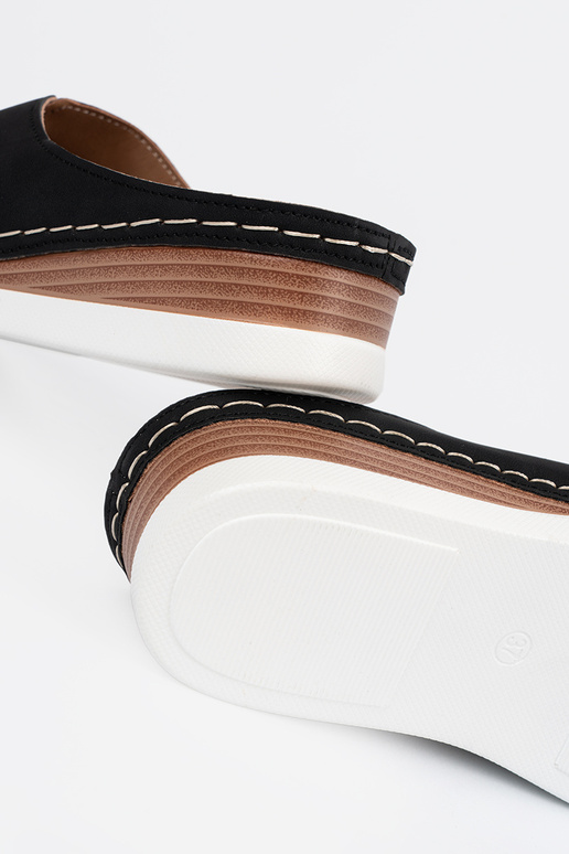 Sieviešu mēteļi melnā krāsā