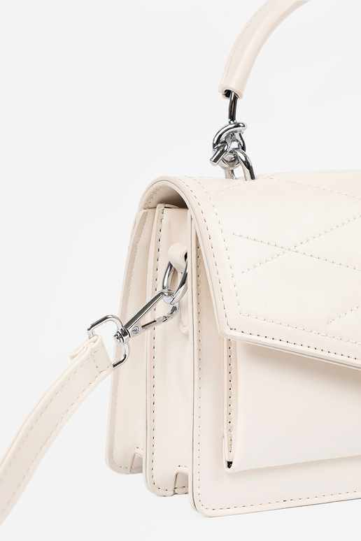 Spilgtā smilšu krāsā mazā eleganta...