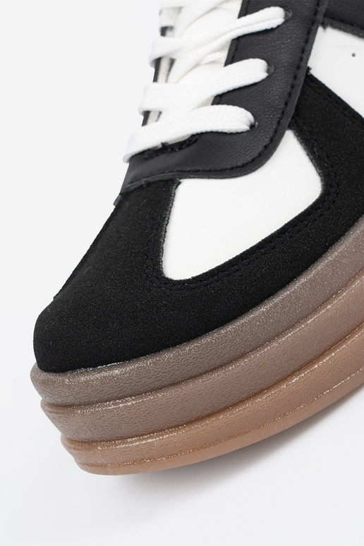 Melni-baltie sporta stila apavi ar...