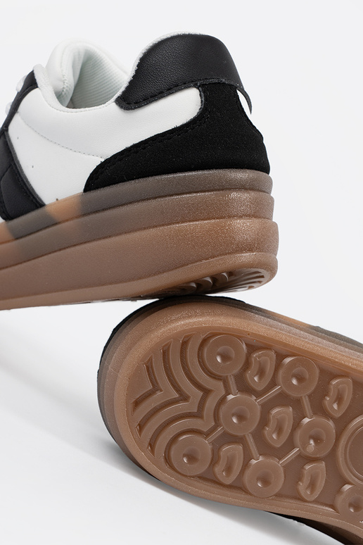 Melni-baltie sporta stila apavi ar...