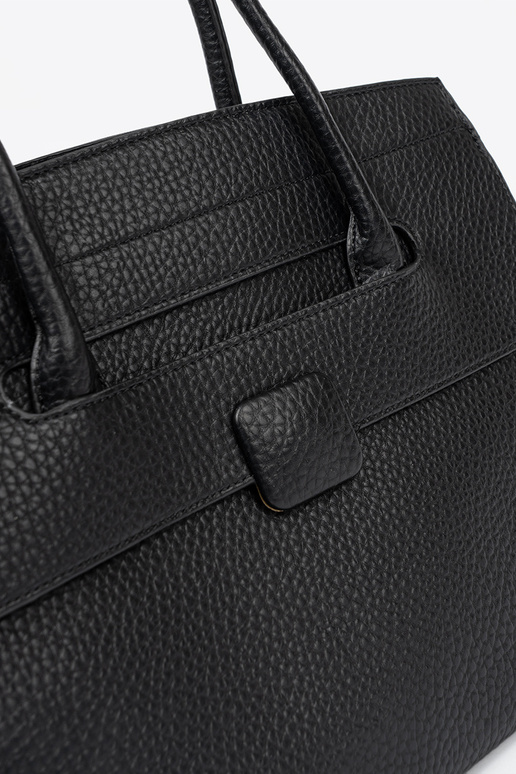 Klasika Soma melns uz pleca