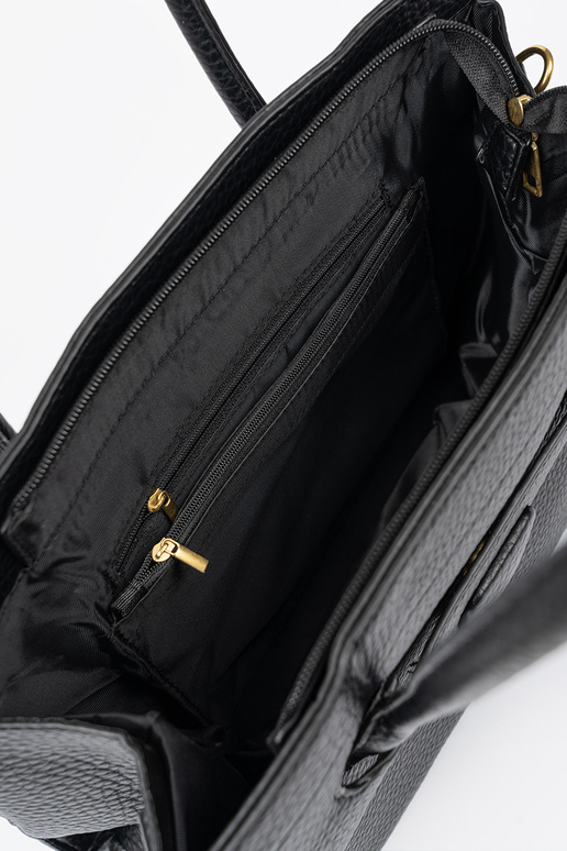 Klasika Soma melns uz pleca