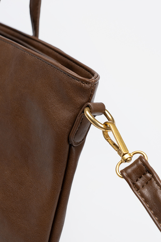 Brūnas krāsas Soma ze zeltainimi elementami