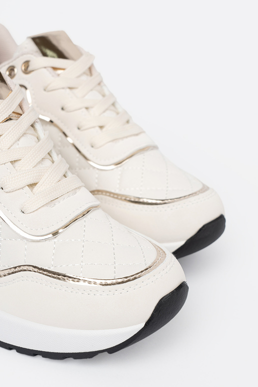 smilšu krāsas Sporta apavi z połyskującymi zeltainimi akcentami