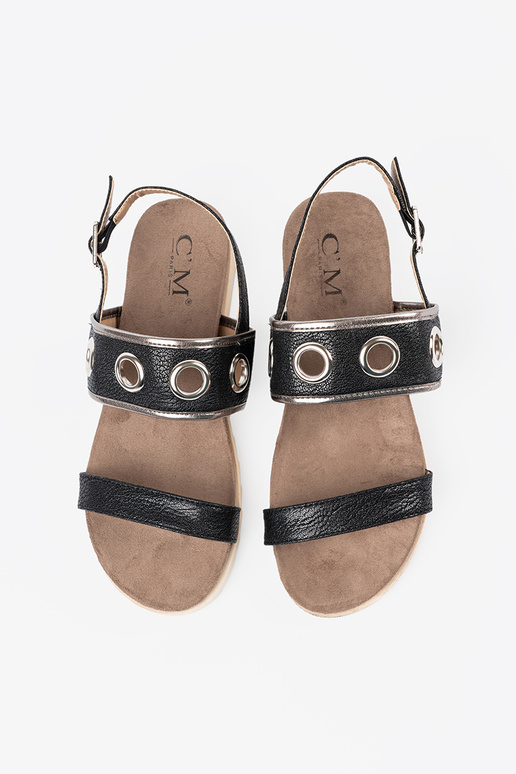 melnas krāsas kurpes z ozdobnymi metaloInymi kółkami