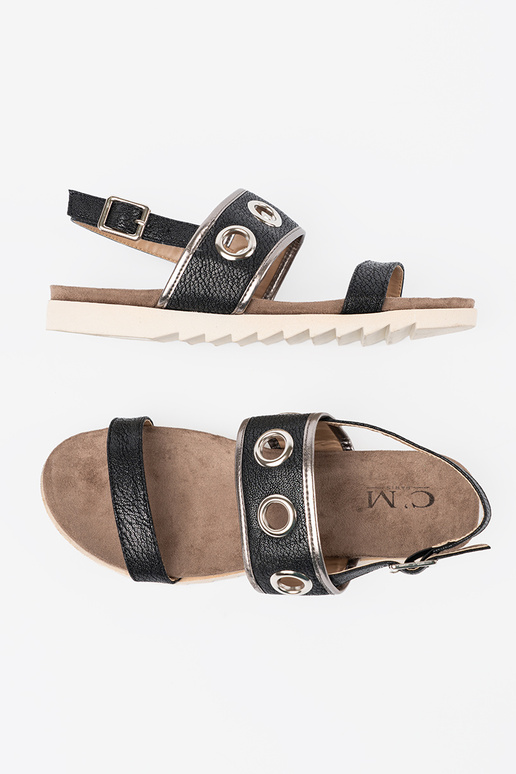 melnas krāsas kurpes z ozdobnymi metaloInymi kółkami