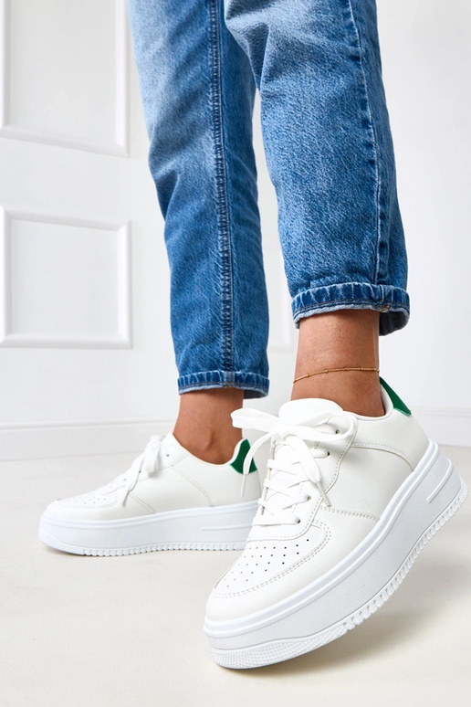 Białe sneakersy na platformie z... Białe sneakersy na platformie z...
