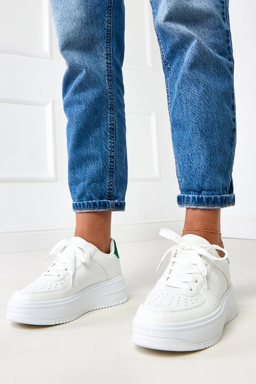 Białe sneakersy na platformie z... Białe sneakersy na platformie z...