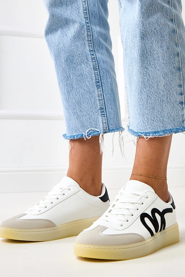 Białe sneakersy na platformie z czarnym motywem Izabell