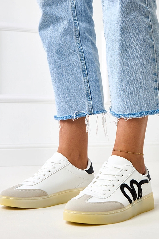 Białe sneakersy na platformie z... Białe sneakersy na platformie z...