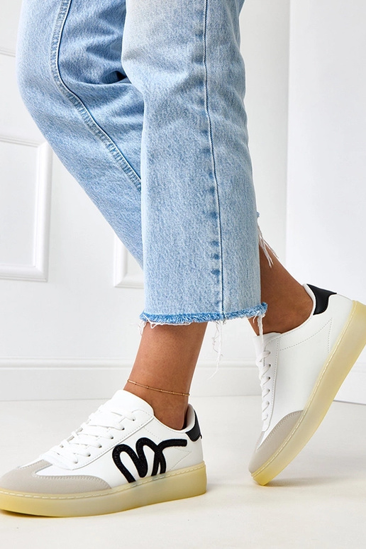 Białe sneakersy na platformie z... Białe sneakersy na platformie z...